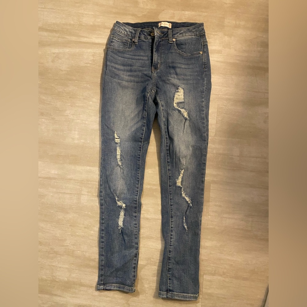 Altar’d Stare straight jeans, slightly distressed medium wash.